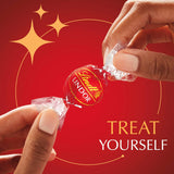lindt lindor milk chocolate candy truffles 15.2 oz bag individually wrapped