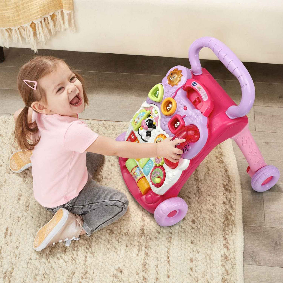 vtech sit-to-stand learning walker with pink frustration free packaging for 9-36 month babies
